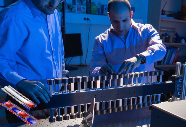 Dr. Nouh (right) and PhD student Attarzadeh (left) operate an elastic metamaterial-based vibration diode